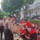 Demo Buruh di Mahkamah Agung Berjalan Tertib, Polisi Turun Tangan dengan Aksi Simpatik